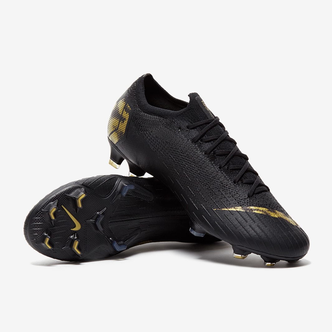 nike gold and black cleats